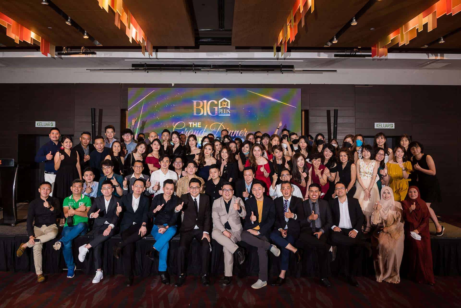 Big Plus Properties company group photo at grand dinner